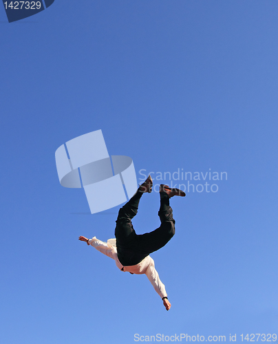 Image of flying businessman