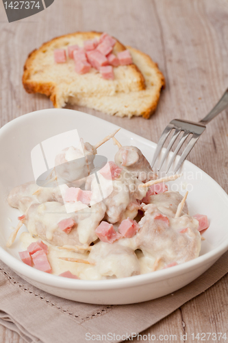 Image of meat rolls and ham