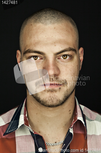 Image of man with tattoos