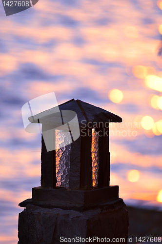 Image of Stone lamp at seashore