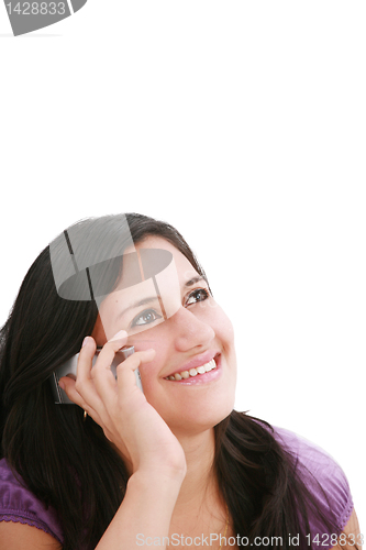 Image of Woman talking on her mobile phone 