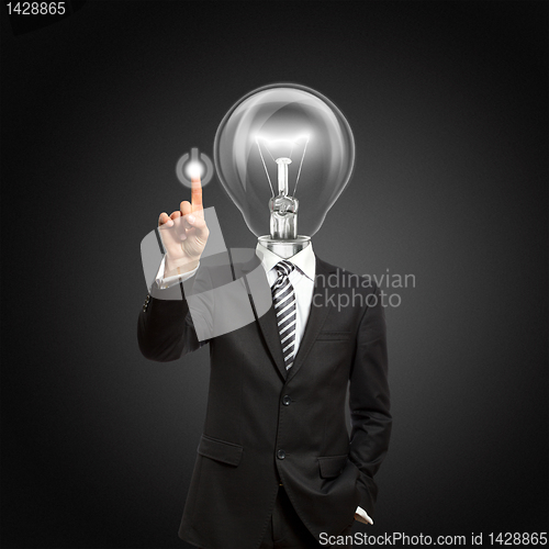 Image of businessman with lamp-head push the button