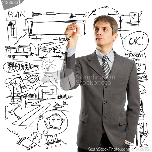 Image of businessman writing something