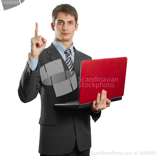 Image of male in suit with laptop with idea