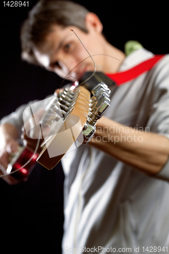 Image of male with guitar