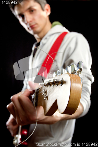 Image of male with guitar