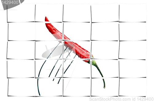 Image of red chili pepper on a fork