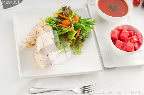 Image of tuna and cheese sandwich with salad