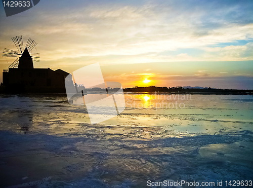 Image of Windmill on sea shore