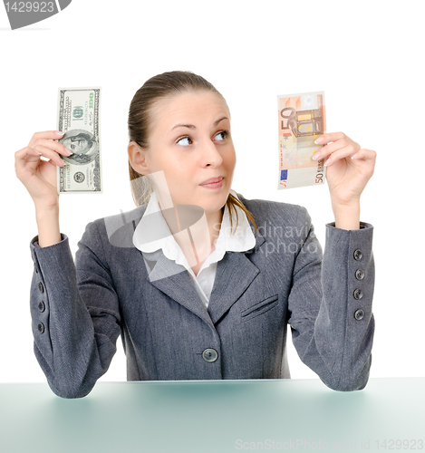 Image of business woman holding a currency