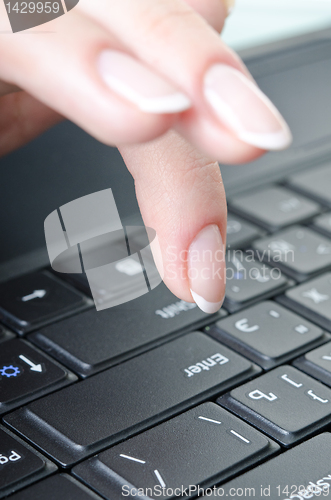 Image of fingers over the keyboard