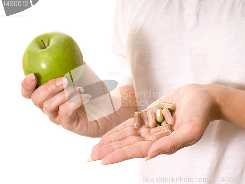 Image of apple and vitamins