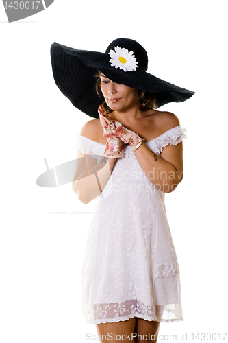 Image of woman in a large black hat