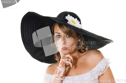 Image of woman in large black hat