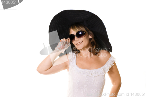 Image of woman in black hat  and sunglasses