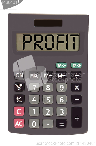 Image of Old calculator on white background showing text "profit"