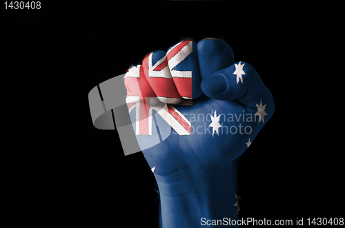 Image of Fist painted in colors of australia flag