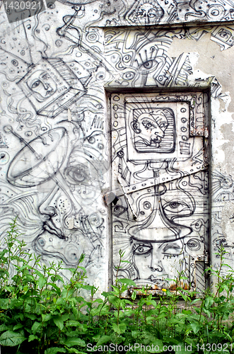 Image of Graffiti on doors and wall 