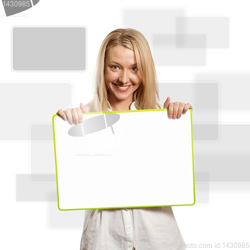 Image of happy businesswoman holding blank white card