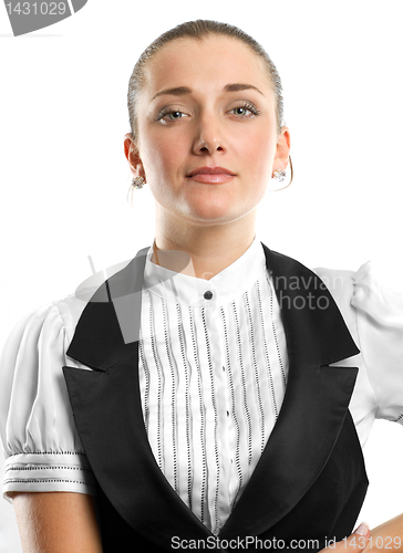 Image of young businesswoman looking on camera