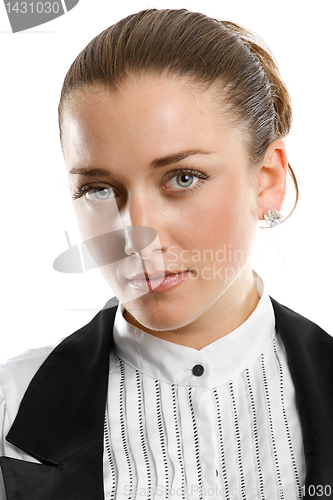 Image of young businesswoman looking on camera
