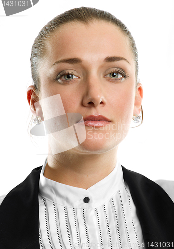 Image of young businesswoman looking on camera