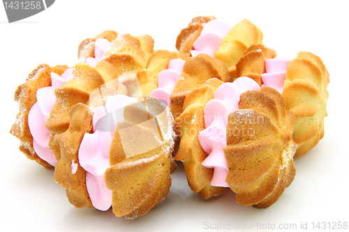 Image of Yellow cookies with a  stuffing  on a white background 