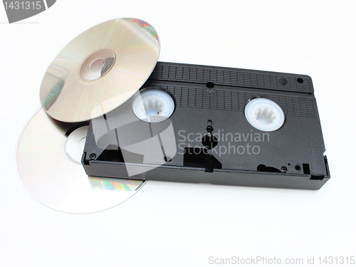 Image of DVD disks and VHS video the cartridge