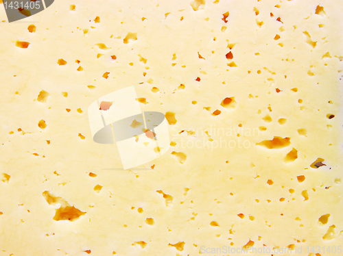 Image of Background of fresh yellow Swiss cheese with holes