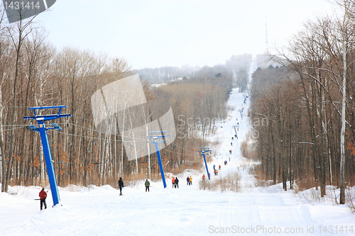 Image of Skiers go on the lift on mountain in Primorski Territory Russia