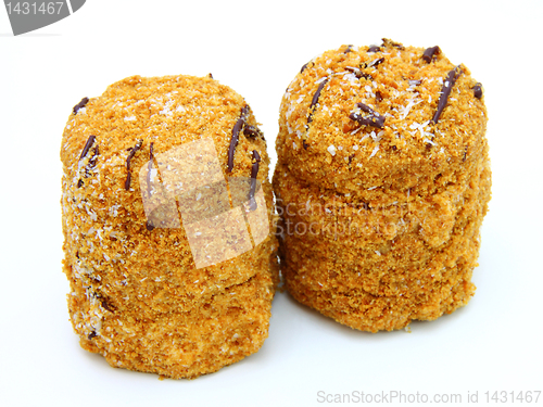 Image of Honey cake with chocolate on a white background