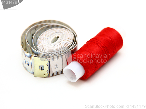 Image of The coil of a red thread with centimeter 