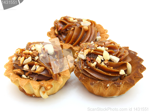 Image of Pie a basket with chocolate condensed milk and nuts 
