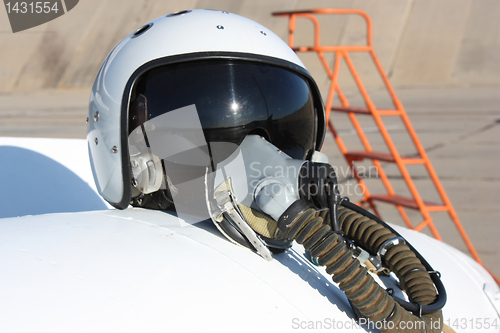 Image of Protective helmet of the pilot against the plane 