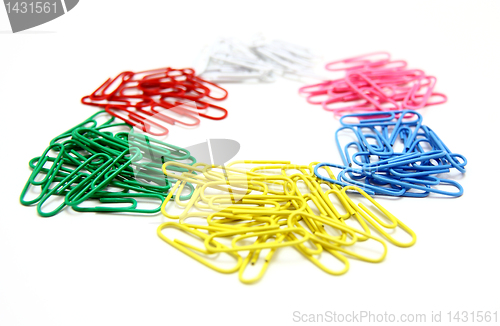 Image of Color paper clips to background. 