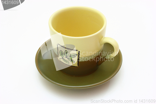 Image of Ceramic cup on a saucer