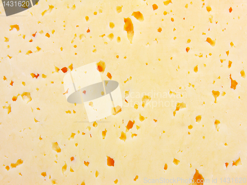 Image of Background of fresh yellow Swiss cheese with holes