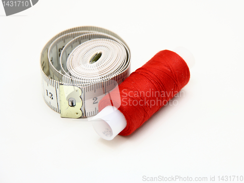 Image of The coil of a red thread with centimeter 