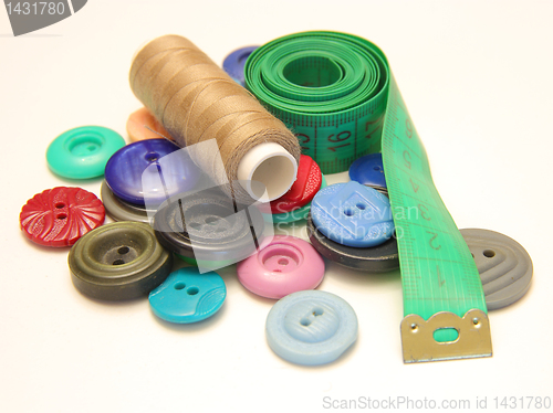 Image of sewing tools on white background