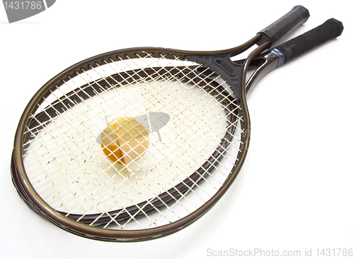 Image of A tennis ball and racket on a white background