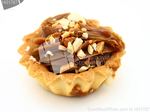 Image of Pie a basket with chocolate condensed milk and nuts