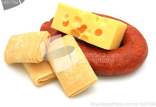 Image of Rolled pancakes with cheese and sausage