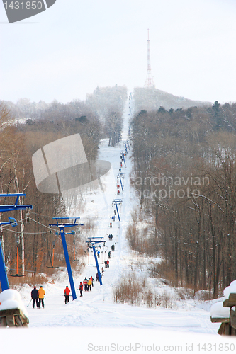 Image of Skiers go on the lift on mountain in Primorski Territory Russia