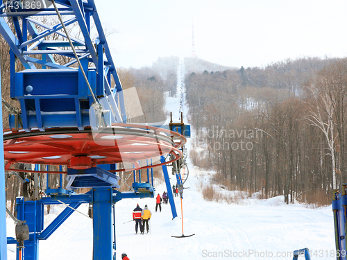 Image of Skiers go on the lift on mountain in Primorski Territory Russia
