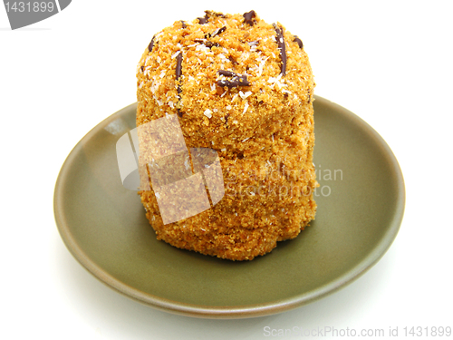 Image of Honey cake with chocolate on a white background