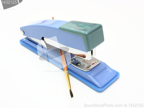 Image of Stapler and brush 