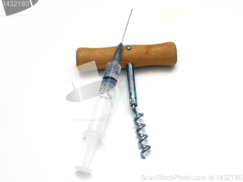 Image of Syringe and corkscrew