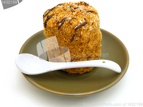 Image of Honey cake with chocolate on a white background