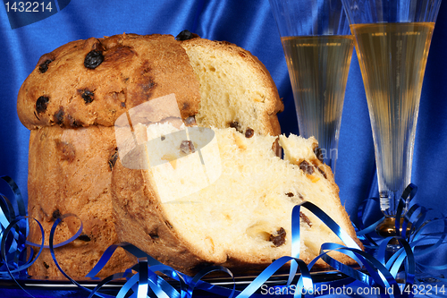 Image of Christmas composition with panettone and spumante