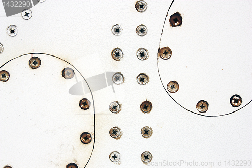 Image of A silver painted metal aircraft background  with  rivets.